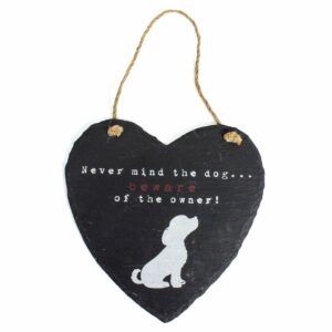 A heart shaped slate sign which says Never Mind the Dog Beware of the Owner