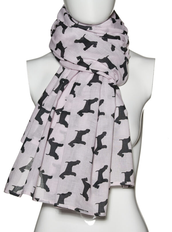 A pale pink cotton scarf with a black Schnauzer silhouette designed by The Lancashire Dog Company