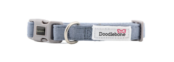 Chalky Blue dog collar with embroidered dog-themed patches and brushed nickel hardware