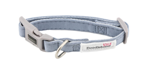 Chalky Blue dog collar with embroidered dog-themed patches and brushed nickel hardware