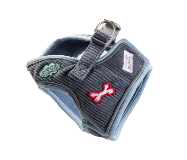 Side view of blue cord dog harness with embroidered patches and reinforced stitching