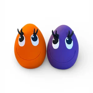 Medium OVO Egg dog toys in purple and orange made from natural rubber