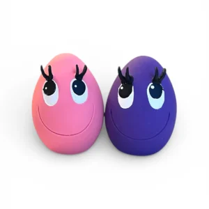 Medium OVO Egg dog toys in pink and purple made from natural rubber